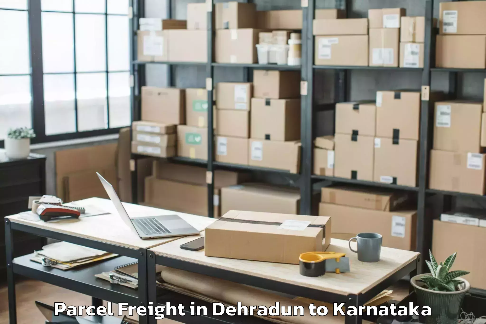 Book Dehradun to Hassan Parcel Freight